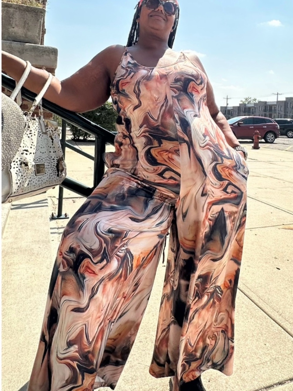 chic Marble Swirl Wide-Leg Jumpsuit in Peach, Black & Cream